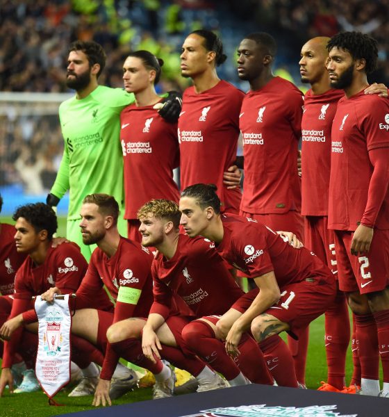 Liverpool players line up before the clash against Rangers.