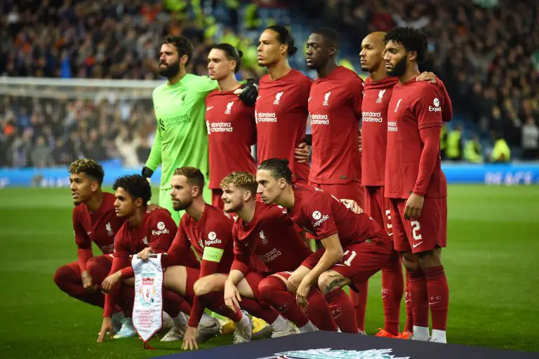 Liverpool players line up before the clash against Rangers.