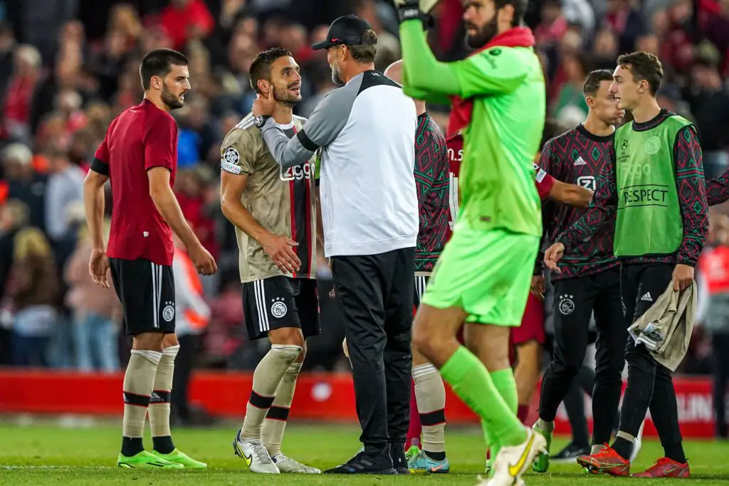 Dusan Tadic of Ajax with Jurgen Klopp of Liverpool.