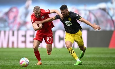 Konrad Laimer of Leipzig is challenged by Salih Ozcan of Borussia Dortmund. (Photo by Stuart Franklin/Getty Images)