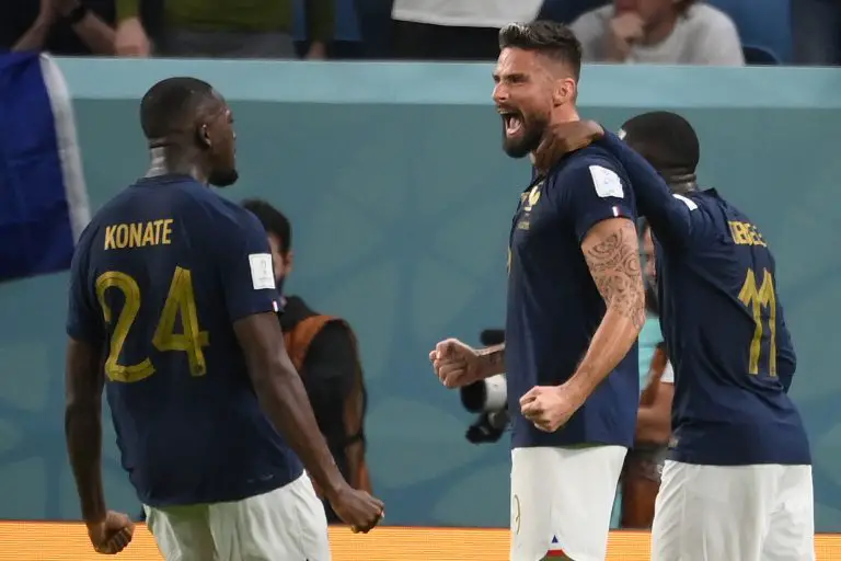 Olivier Giroud celebrates scoring for France with Ibrahima Koante (L) and Ousmane Dembele (R). (Photo by FRANCK FIFE/AFP via Getty Images)