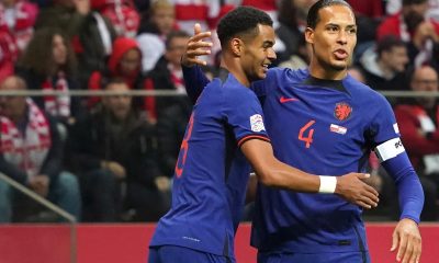 Cody Gakpo with Netherlands teammate and Liverpool centre-back, Virgil van Dijk.