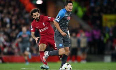 Mohamed Salah of Liverpool is challenged by Kim Min-Jae of Napoli.