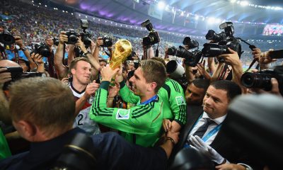 Ron-Robert Zieler of Germany celebrates with the World Cup trophy after defeating Argentina.