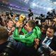 Ron-Robert Zieler of Germany celebrates with the World Cup trophy after defeating Argentina.