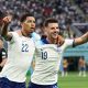 Jude Bellingham of England celebrates with Mason Mount after scoring against Iran. (Photo by Clive Brunskill/Getty Images)