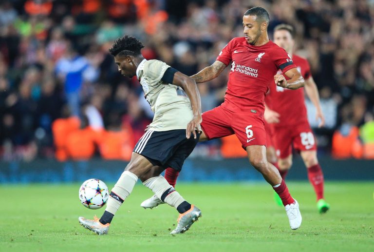 Ajax's Mohammed Kudus fights for the ball with Liverpool's Thiago Alcantara.