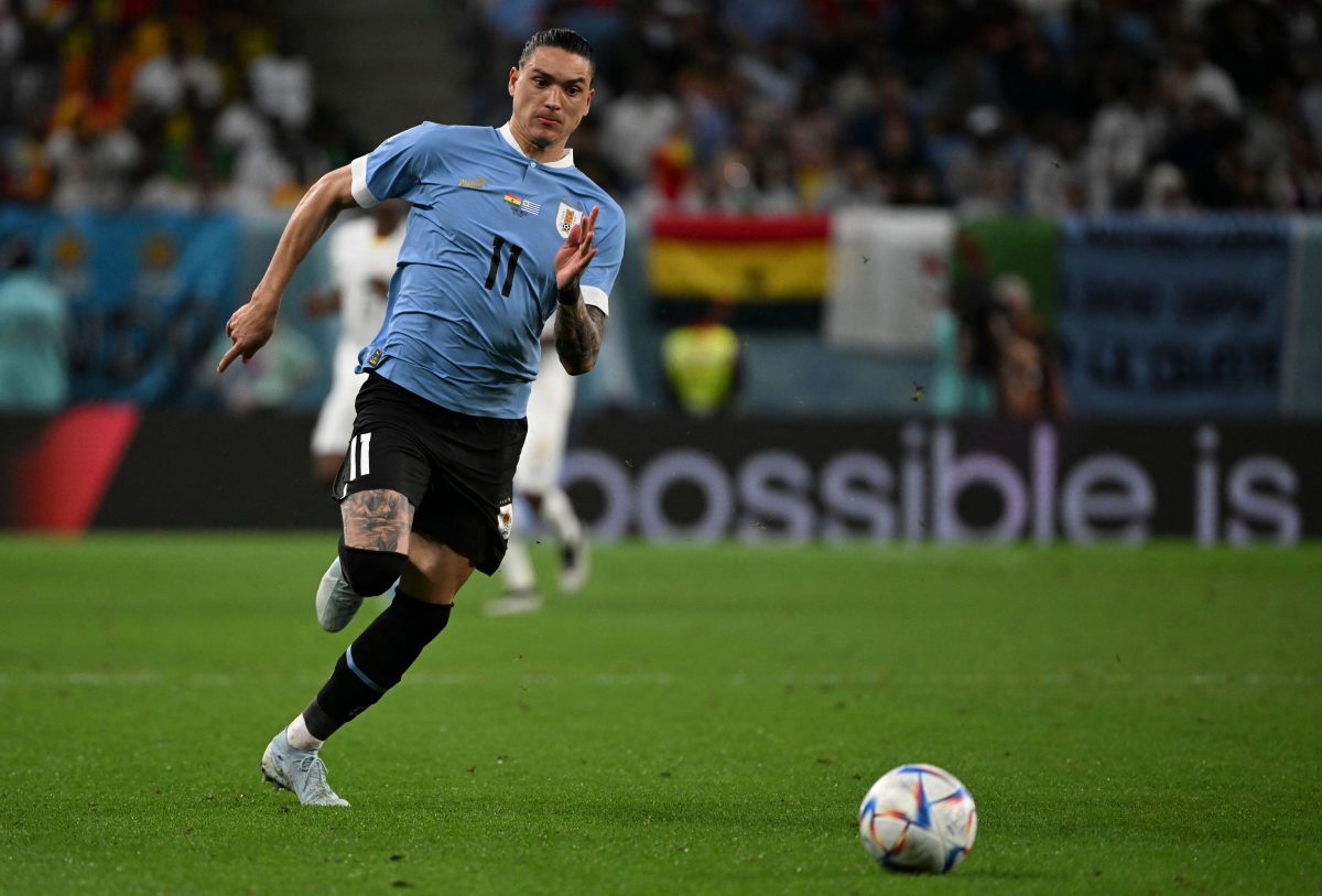 Uruguay's forward Darwin Nunez runs for the ball during a Qatar 2022 World Cup game. (Photo by PABLO PORCIUNCULA/AFP via Getty Images)
