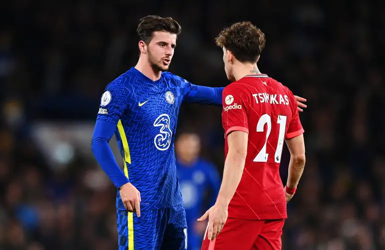 Mason Mount of Chelsea clashes with Kostas Tsimikas of Liverpool.