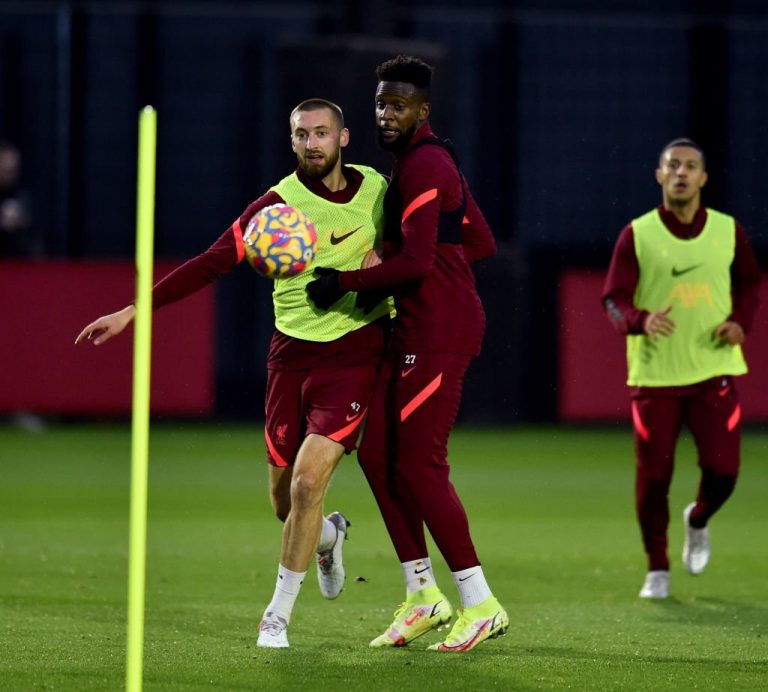 Nathaniel Phillips and Divock Origi of Liverpool during a training session.