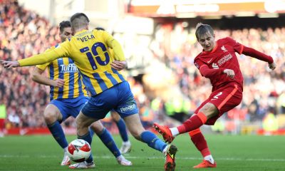 Max Woltman of Liverpool shoots during a game against Shrewsbury Town. (Photo by Clive Brunskill/Getty Images)