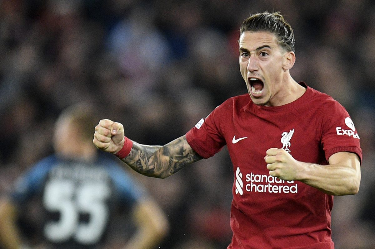 Liverpool's Greek defender Kostas Tsimikas celebrates after Liverpool's Uruguayan striker Darwin Nunez (not seen) scores his team's second goal during the UEFA Champions League group A football match between Liverpool and Napoli in Liverpool, north west England on November 1, 2022.
