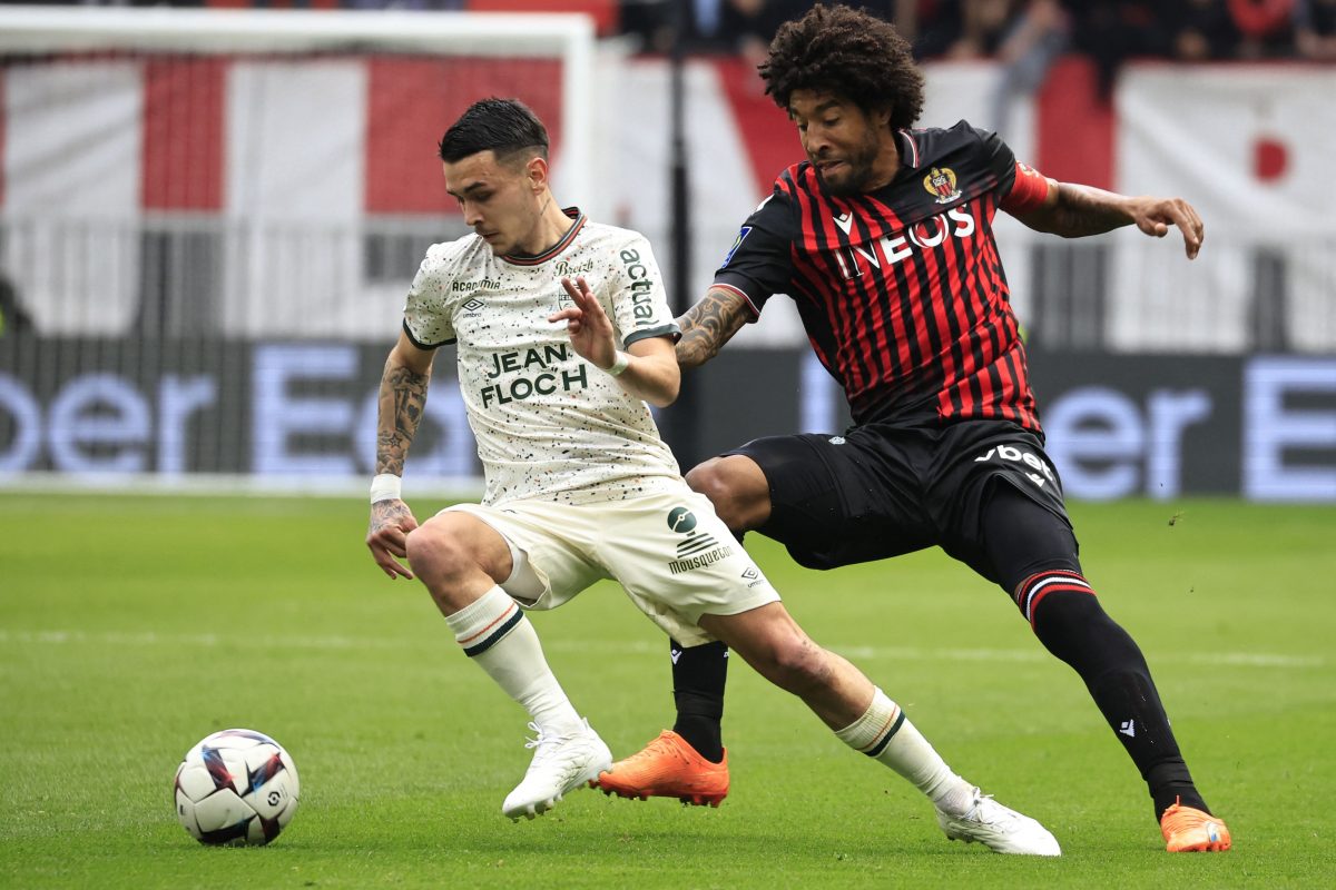 Lorient's French midfielder Enzo Le Fee (L) fights for the ball with Nice's Brazilian defender Dante during the French L1 football match between OGC Nice and FC Lorient at the Allianz Riviera Stadium in Nice, south-eastern France, on March 19, 2023.