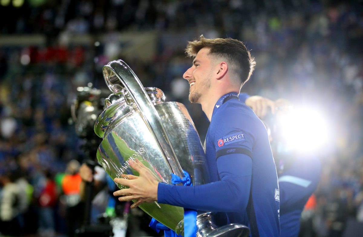 Mason Mount of Chelsea celebrates with the Champions League Trophy. 