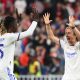 Real Madrid's Angolan midfielder Eduardo Camavinga celebrates with Luka Modric.