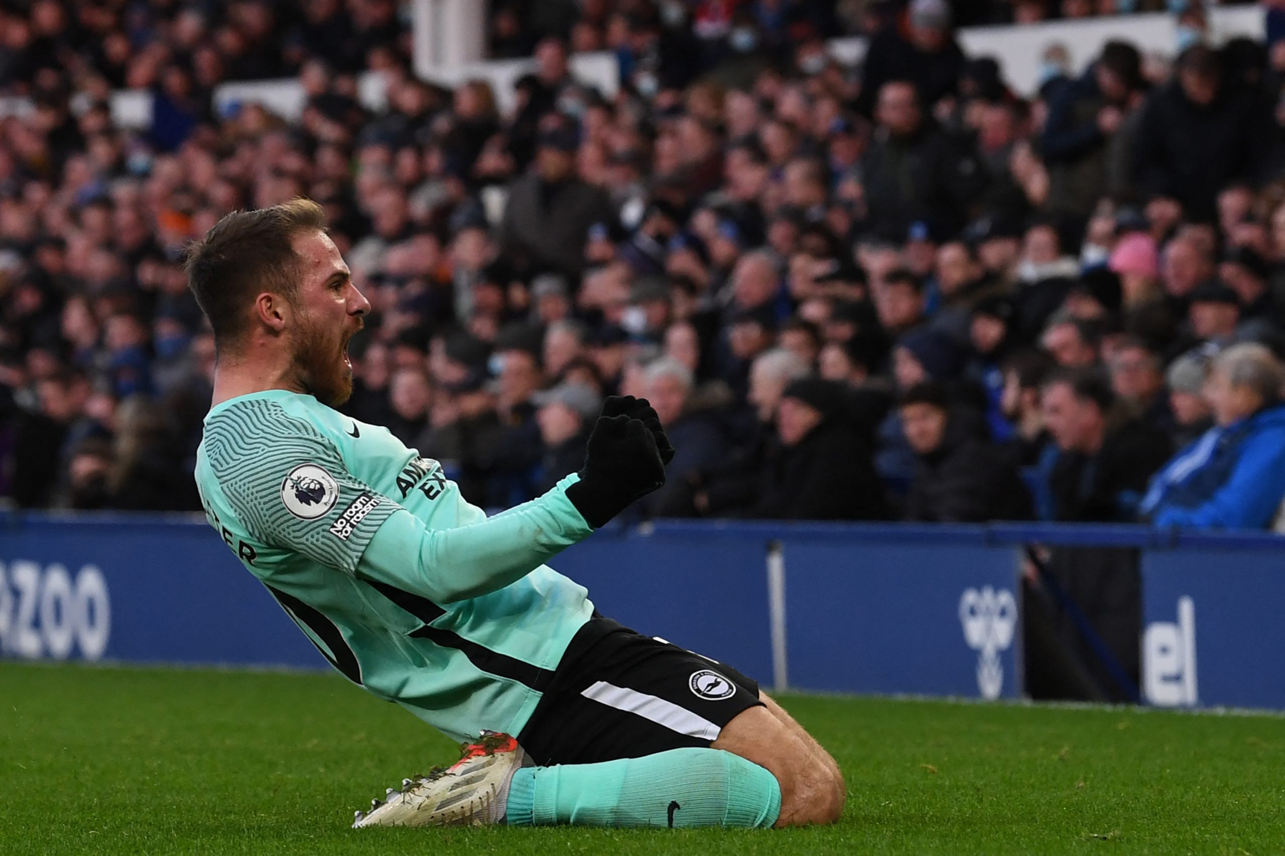 Brighton's Argentinian midfielder Alexis Mac Allister celebrates after scoring against Everton.