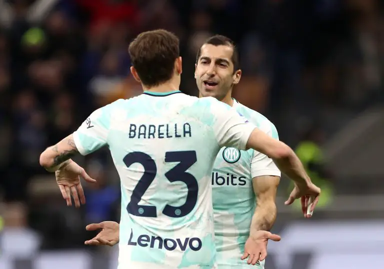 Henrikh Mkhitaryan of FC Internazionale celebrates with teammate Nicolo Barella after scoring.