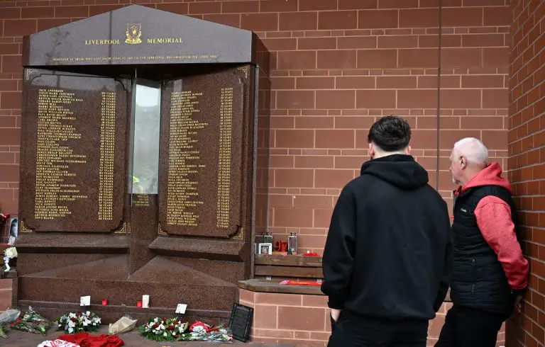 Fans look at the Liverpool Memorial for the fans who lost their lives at the 1989 Hillsborough disaster.