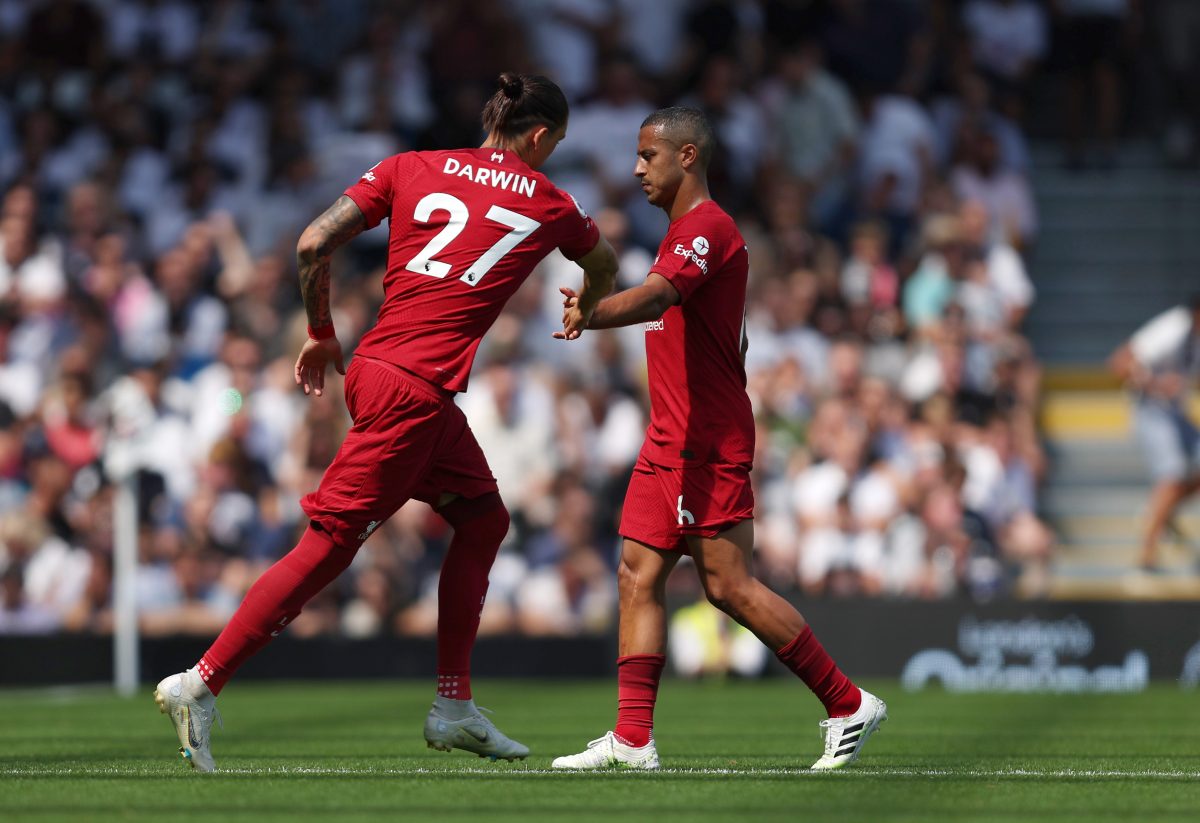 LONDON, ENGLAND - AUGUST 06: Substitute Darwin Nunez high fives Thiago Alcantara of Liverpool as they leave the field during the Premier League match between Fulham FC and Liverpool FC at Craven Cottage on August 06, 2022 in London, England.
