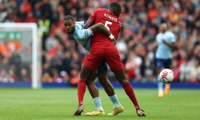 Brentford's English striker Ivan Toney fights for the ball with Liverpool's French defender Ibrahima Konate.