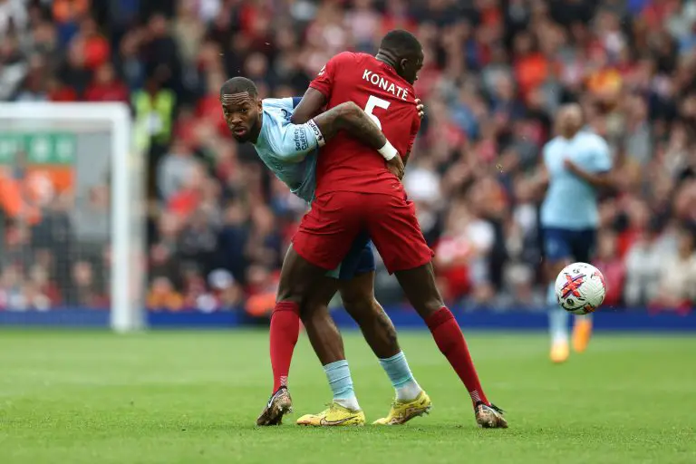 Brentford's English striker Ivan Toney fights for the ball with Liverpool's French defender Ibrahima Konate.