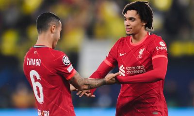 Thiago Alcantara and Trent Alexander-Arnold of Liverpool shake hands.