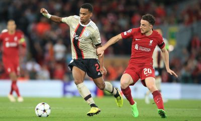 Ajax's Dutch defender Jurrien Timber fights for the ball with Liverpool's Diogo Jota - September 2022.