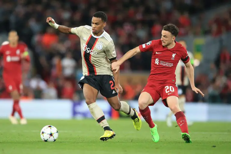 Ajax's Dutch defender Jurrien Timber fights for the ball with Liverpool's Diogo Jota - September 2022.