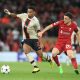 Ajax's Dutch defender Jurrien Timber fights for the ball with Liverpool's Diogo Jota - September 2022.