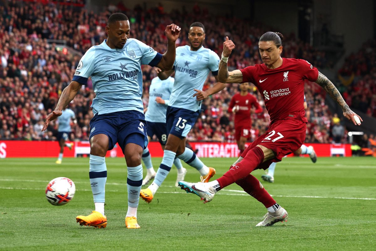 Liverpool's Uruguayan striker Darwin Nunez fights for the ball with Brentford's Ethan Pinnock.