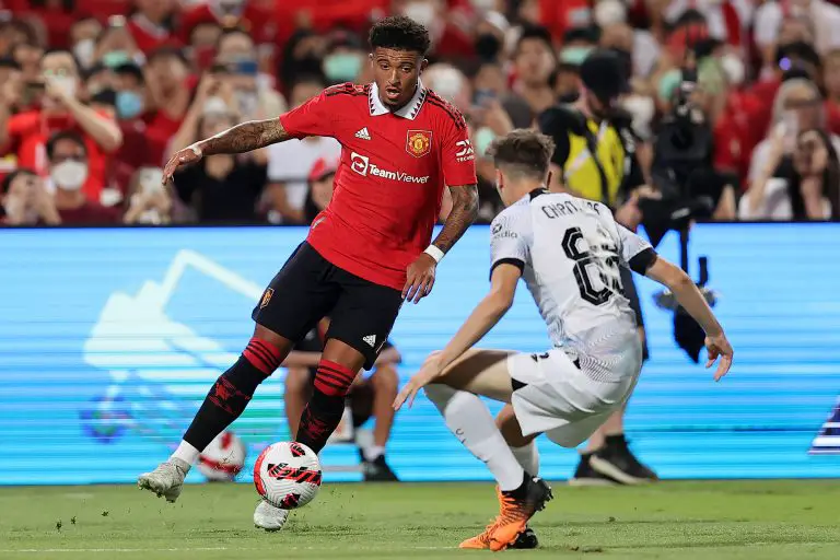 Jadon Sancho of Manchester United controls the ball against Luke Chambers of Liverpool.