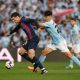 Andreas Christensen of FC Barcelona is challenged by Gabri Veiga of RC Celta.