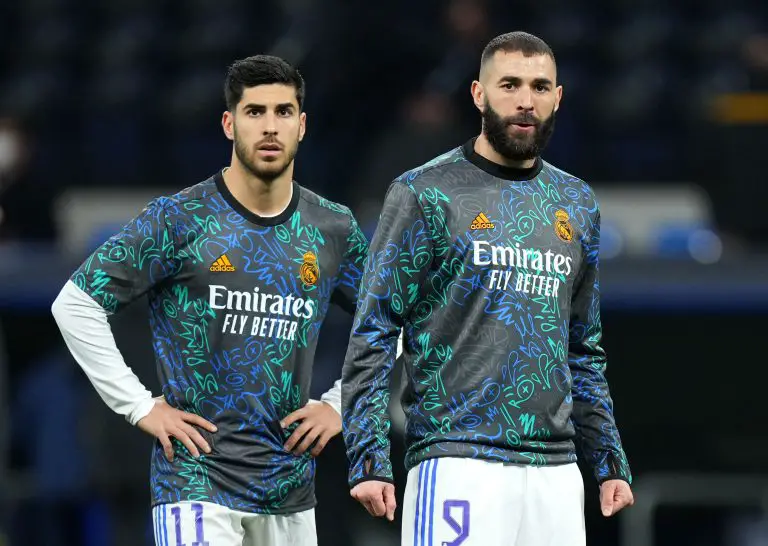 Marco Asensio and Karim Benzema of Real Madrid.