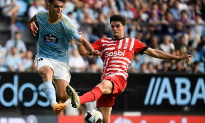 Celta Vigo's Spanish midfielder Gabriel Veiga fights for the ball with Girona's Spanish defender Miguel Gutierrez.