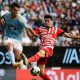 Celta Vigo's Spanish midfielder Gabriel Veiga fights for the ball with Girona's Spanish defender Miguel Gutierrez.