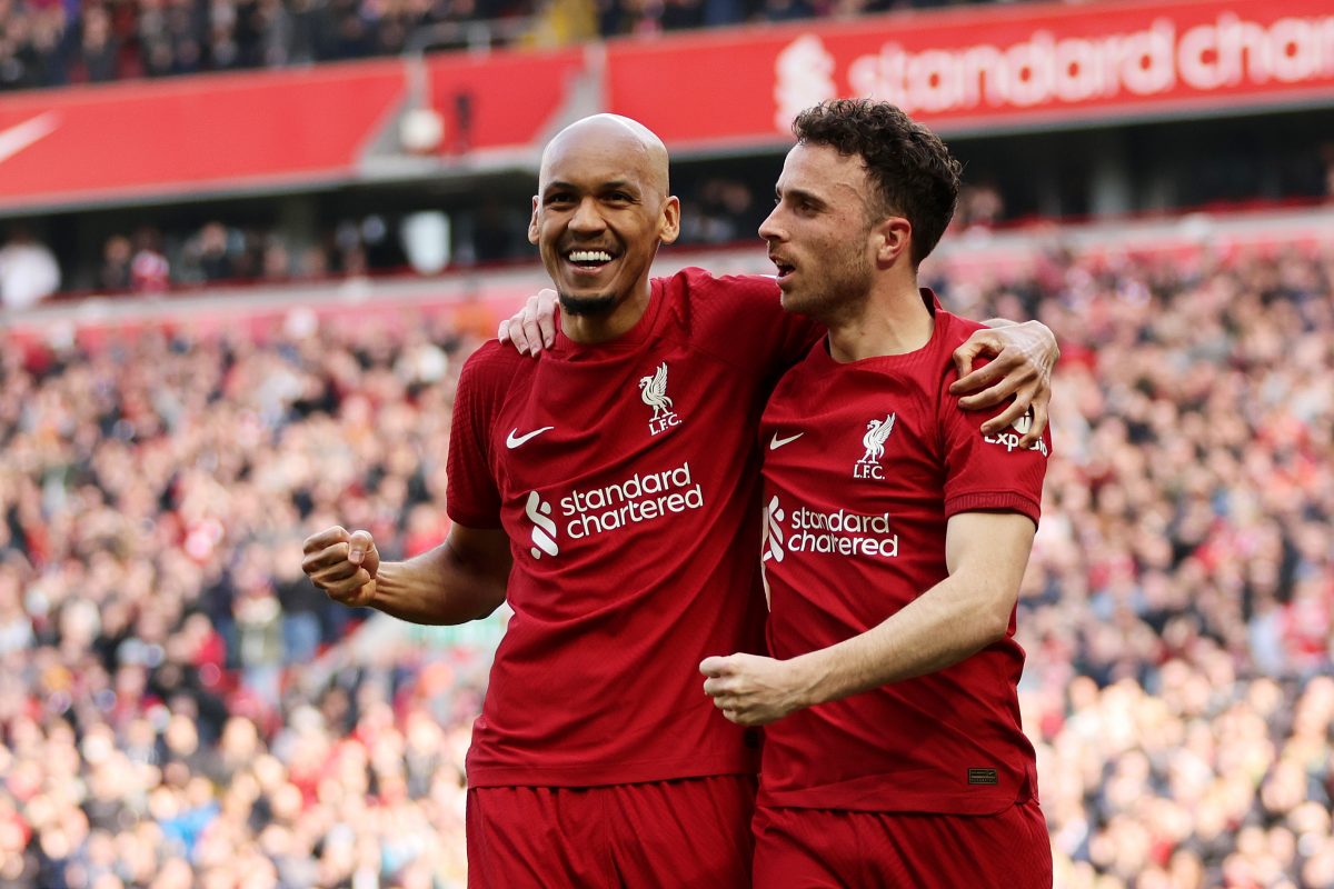 Diogo Jota of Liverpool celebrates with teammate Fabinho after scoring. 