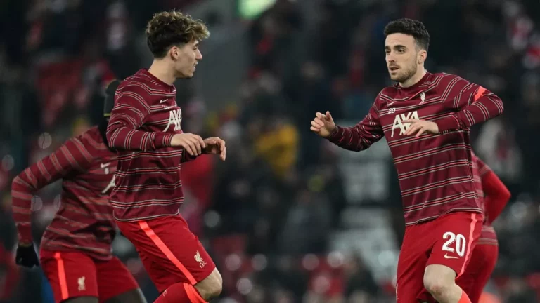 Diogo Jota lauds Kostas Tsimikas after Liverpool FC's win over Brentford.