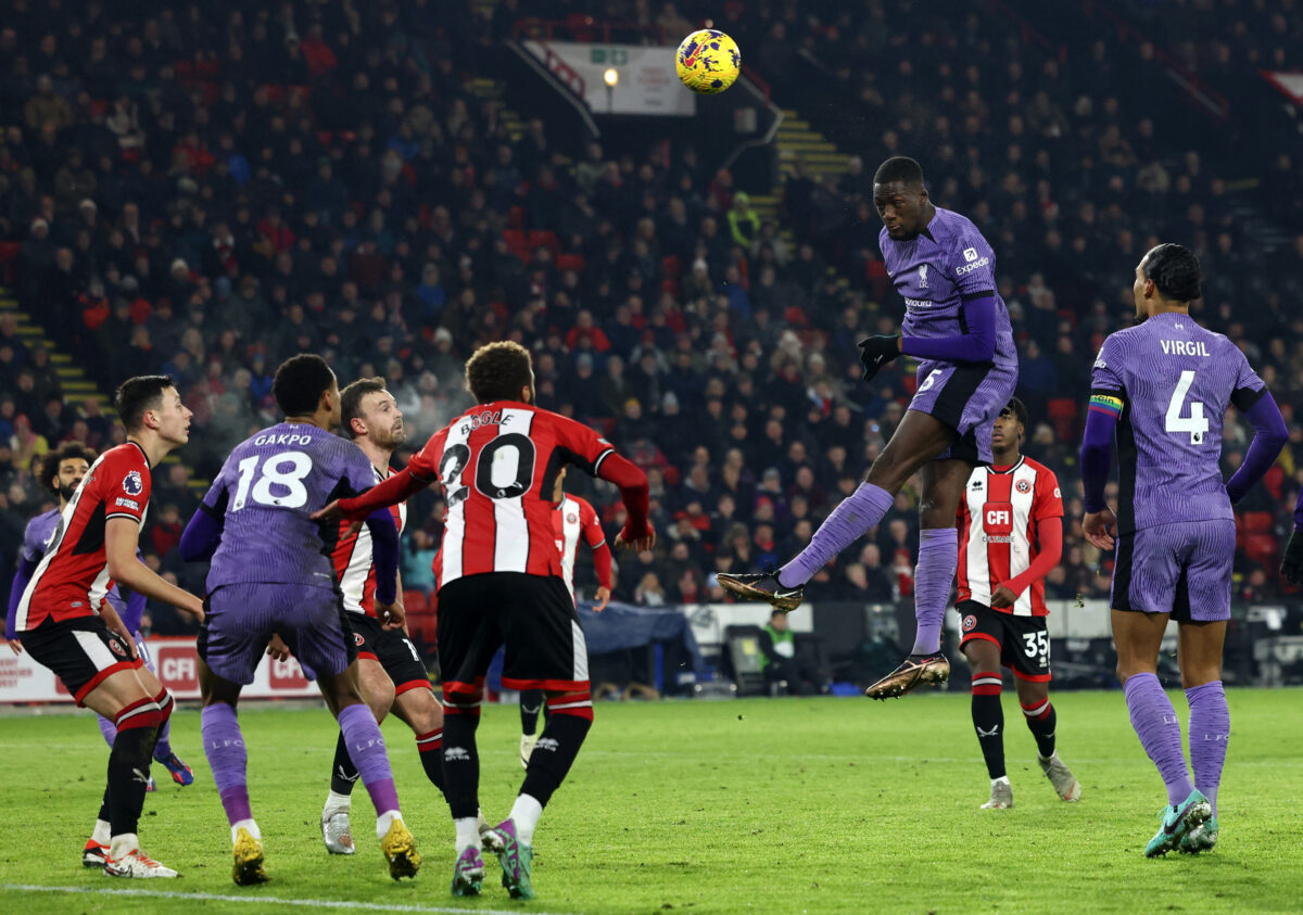 Liverpool's French defender #05 Ibrahima Konate headers toward goal but has his shot saved during the English Premier League football match between Sheffield United and Liverpool at Bramall Lane in Sheffield, northern England on December 6, 2023. (Photo by Darren Staples / AFP) / RESTRICTED TO EDITORIAL USE. No use with unauthorized audio, video, data, fixture lists, club/league logos or 'live' services. Online in-match use limited to 120 images. An additional 40 images may be used in extra time. No video emulation. Social media in-match use limited to 120 images. An additional 40 images may be used in extra time. No use in betting publications, games or single club/league/player publications. /  (Photo by DARREN STAPLES/AFP via Getty Images)