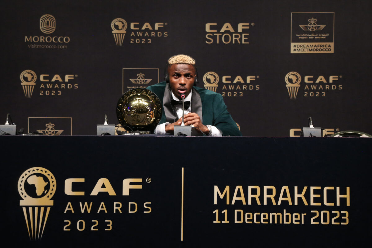 Victor Osimhen of Nigeria receives the Men's Player of the Year award during the 2023 Confederation of African Football (CAF) Awards in Marrakesh on December 11, 2023. (Photo by AFP) (Photo by STR/AFP via Getty Images)