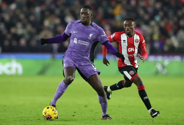 SHEFFIELD, ENGLAND - DECEMBER 06: Ibrahima Konate of Liverpool moves away from Benie Traore during the Premier League match between Sheffield United and Liverpool FC at Bramall Lane on December 06, 2023 in Sheffield, England. (Photo by David Rogers/Getty Images)