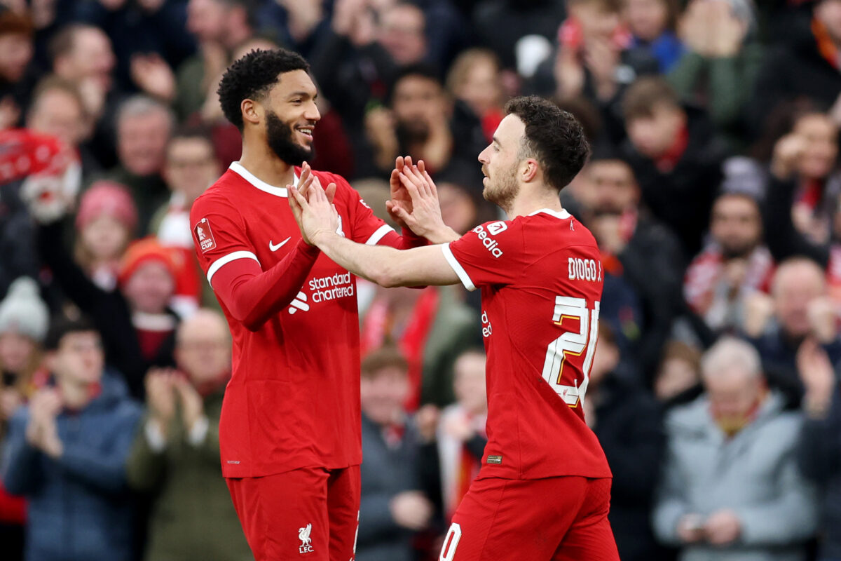 LIVERPOOL, ENGLAND - JANUARY 28: Diogo Jota of Liverpool celebrates with Joe Gomez of Liverpool after scoring his team's third goal during the Emirates FA Cup Fourth Round match between Liverpool and Norwich City at Anfield on January 28, 2024 in Liverpool, England. (Photo by Clive Brunskill/Getty Images)