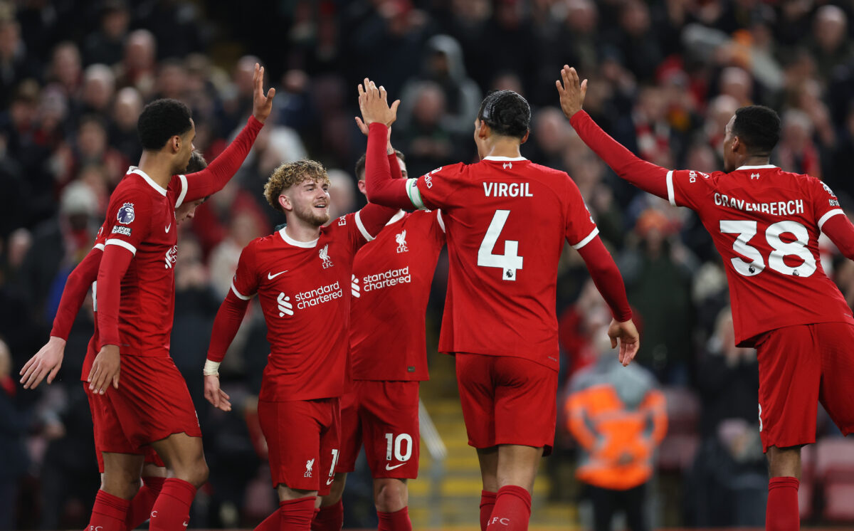 LIVERPOOL, ENGLAND - FEBRUARY 21: Virgil van Dijk (4) of Liverpool celebrates with team mate Harvey Elliott after he has scored the teams first goal during the Premier League match between Liverpool FC and Luton Town at Anfield on February 21, 2024 in Liverpool, England. (Photo by Clive Brunskill/Getty Images)