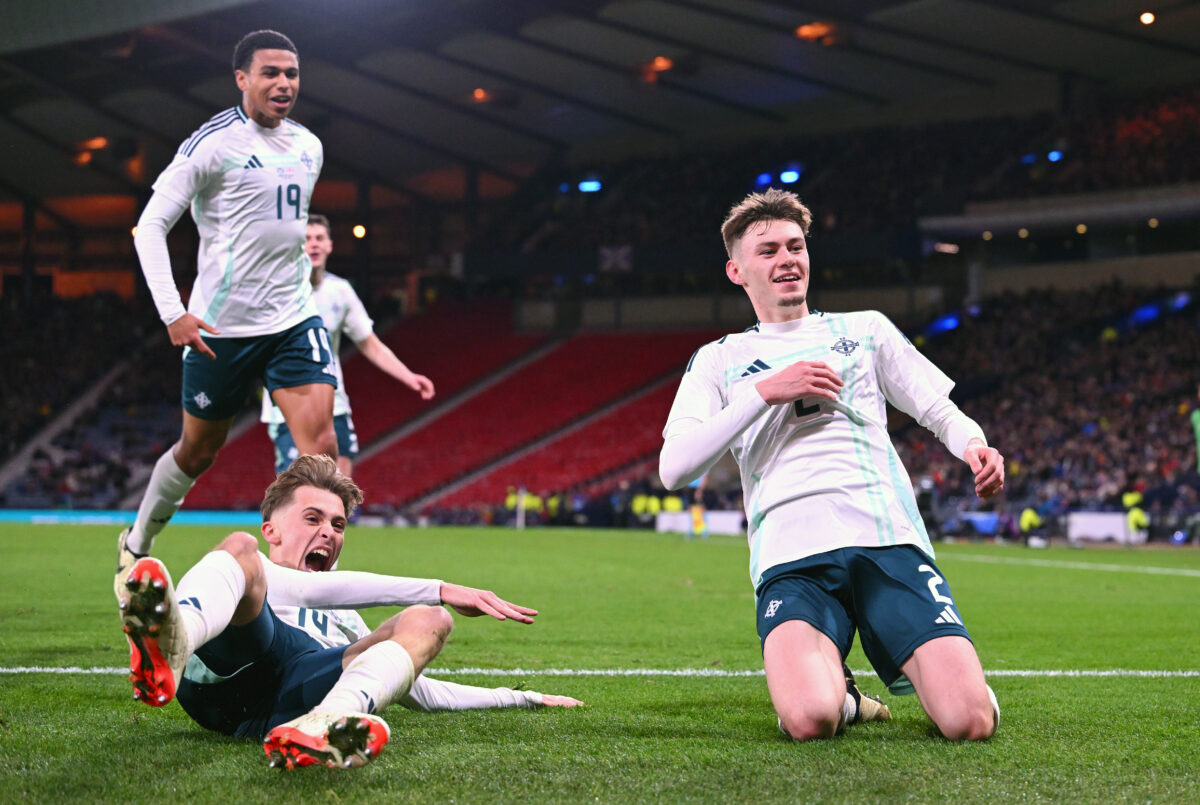 GLASGOW, SCOTLAND - MARCH 26: Conor Bradley of Northern Ireland celebrates with teammates after scoring his team's first goal during the international friendly match between Scotland and Northern Ireland at Hampden Park on March 26, 2024 in Glasgow, Scotland. (Photo by Stu Forster/Getty Images)