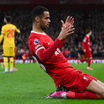 Liverpool's Dutch striker #18 Cody Gakpo celebrates after scoring his team third goal during the English Premier League football match between Liverpool and Sheffield United at Anfield in Liverpool, north west England on April 4, 2024. (Photo by Paul ELLIS / AFP) / RESTRICTED TO EDITORIAL USE. No use with unauthorized audio, video, data, fixture lists, club/league logos or 'live' services. Online in-match use limited to 120 images. An additional 40 images may be used in extra time. No video emulation. Social media in-match use limited to 120 images. An additional 40 images may be used in extra time. No use in betting publications, games or single club/league/player publications. / (Photo by PAUL ELLIS/AFP via Getty Images)