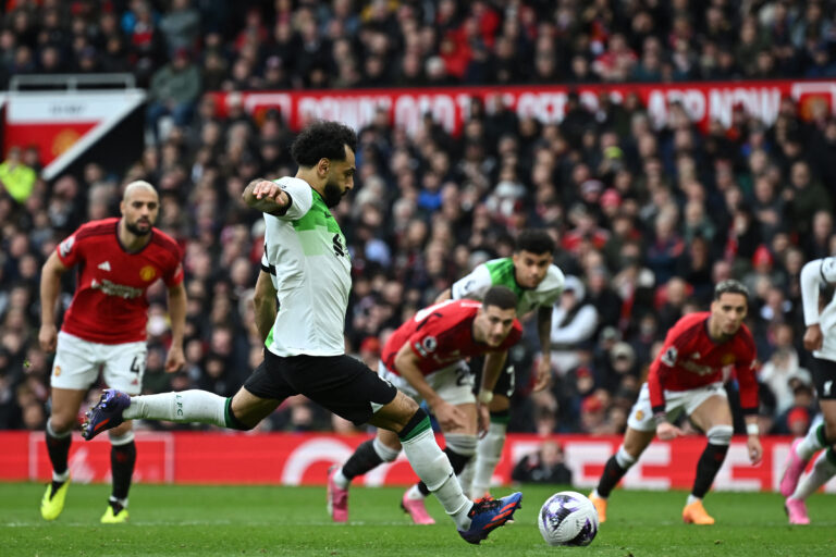 Mo Salah etches his name into the history books as Liverpool fight Manchester United to a 2-2 draw.