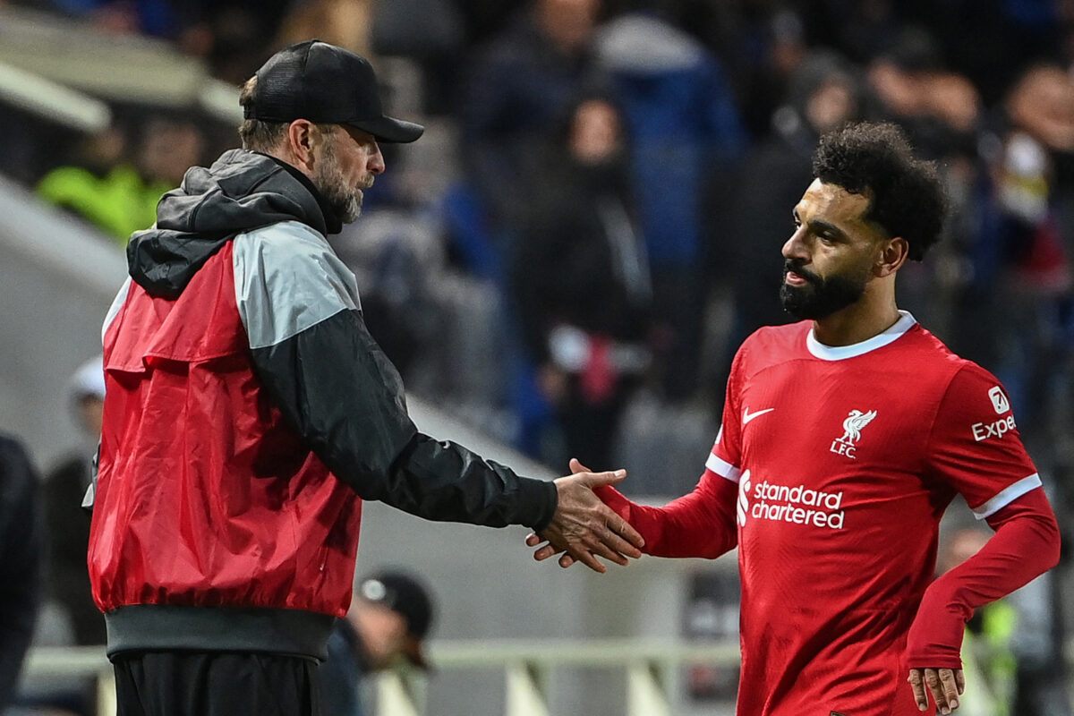 Liverpool's German head coach Jurgen Kloppduring  (L) acknowledges Liverpool's Egyptian forward #11 Mohamed Salah as he leaves the pitch during the UEFA Europa League quarter-final second leg football match between Atalanta BC and Liverpool FC at the Atleti Azzurri d'Italia Stadium in Bergamo, on April 18, 2024. (Photo by Isabella BONOTTO / AFP) (Photo by ISABELLA BONOTTO/AFP via Getty Images)