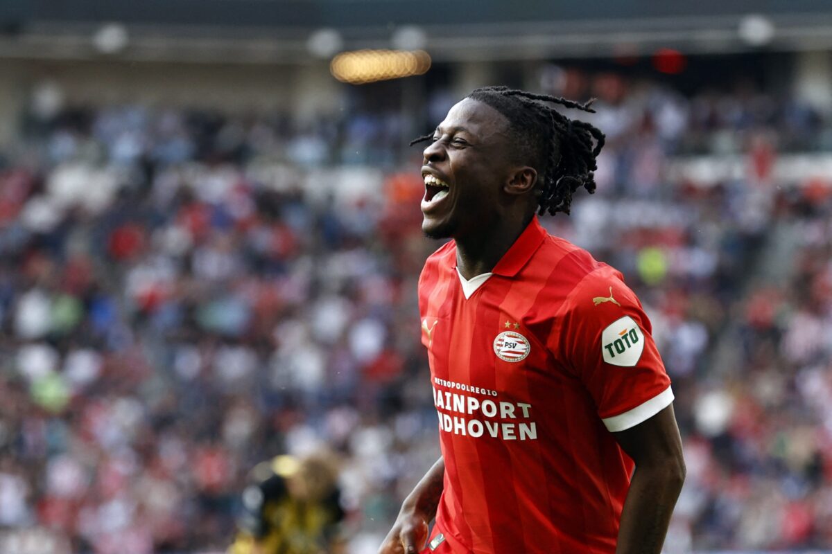 PSV's Belgium forward #11 Johan Bakayoko celebrates after scoring his fourth goal during the Dutch Eredivisie football match between PSV Eindhoven and Vitesse Arnhem at the Phillips stadium, in Eindhoven, on April 13, 2024. (Photo by MAURICE VAN STEEN / ANP / AFP) / Netherlands OUT (Photo by MAURICE VAN STEEN/ANP/AFP via Getty Images)