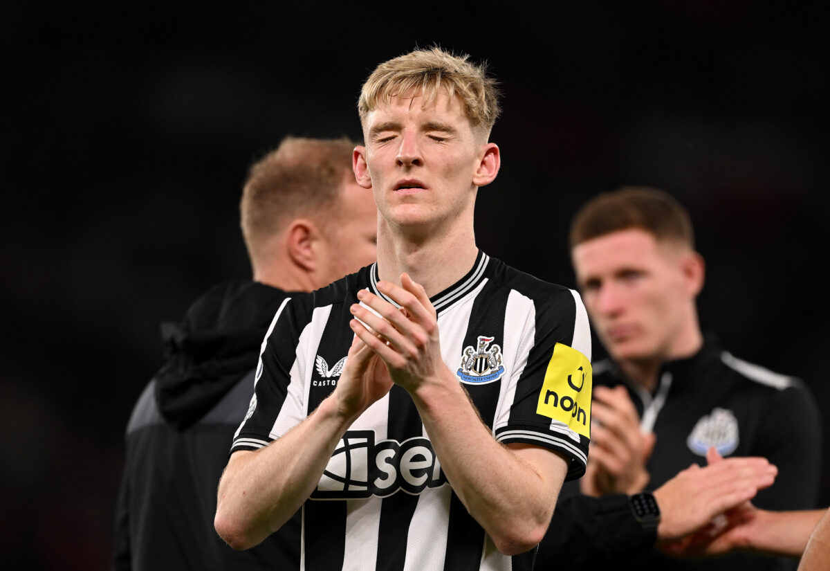 MANCHESTER, ENGLAND - MAY 15: Anthony Gordon of Newcastle United applauds the fans after the team's defeat during the Premier League match between Manchester United and Newcastle United at Old Trafford on May 15, 2024 in Manchester, England. (Photo by Stu Forster/Getty Images)