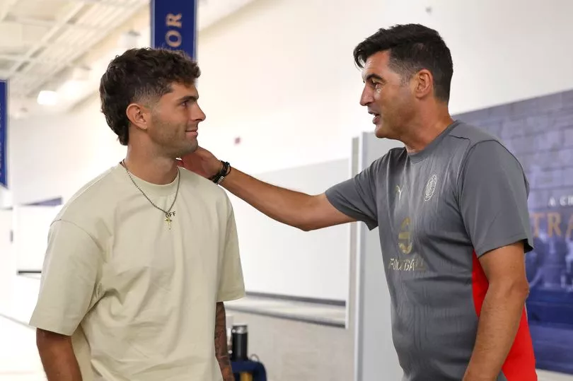  Christian Pulisic and Paulo Fonseca (Photo by Giuseppe Cottini/AC Milan via Getty Images)