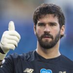 Alisson Becker prepared to stay at Liverpool despite Giorgi Mamardashvili signing.